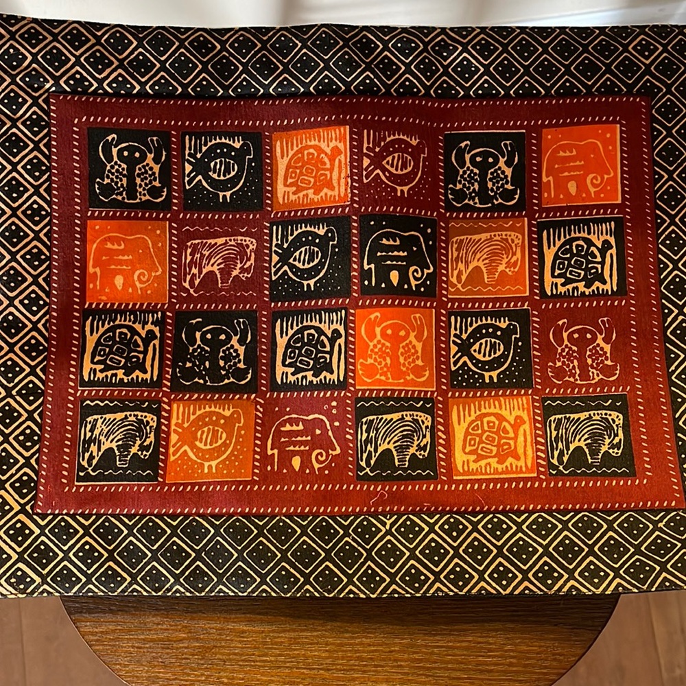Hand painted.    Set of 6 table place mats.      From Son Praise Mutamba